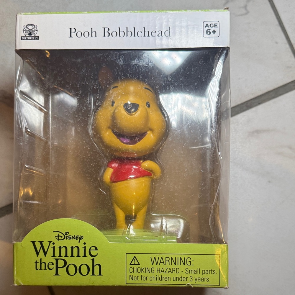 Disney Winnie the Pooh Bobblehead in Yellow and Red